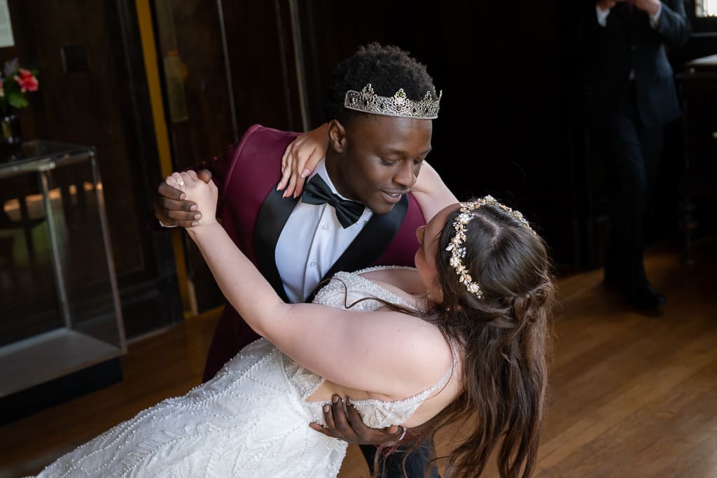 Bride and groom first dance during their French-inspired wedding ceremony at Wyeth-Tootle Mansion in St. Joseph, Missouri