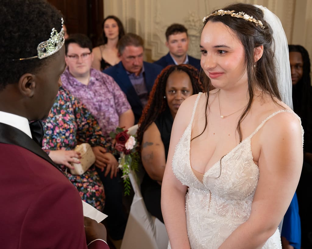 Emotional bride during her French-inspired wedding ceremony at Wyeth-Tootle Mansion in St. Joseph, Missouri