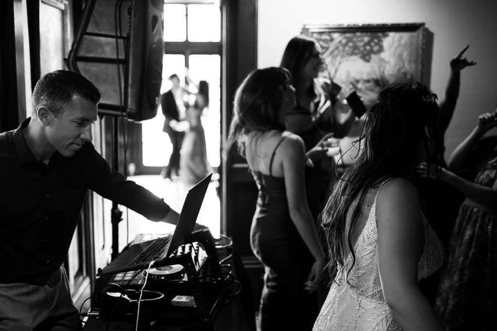 Dj and guests dancing during a French inspired wedding near Kansas City. Wyethtootle Mansion in Saint Joseph