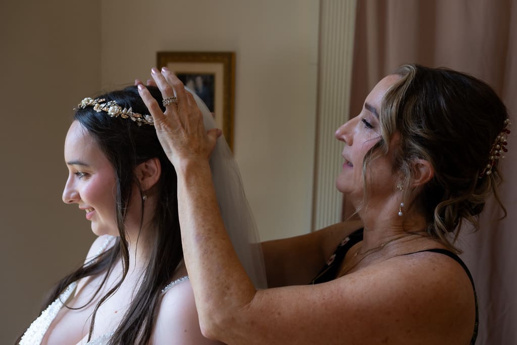French inspired wedding Kansas City, Bride's mom setting up the veil and crown.