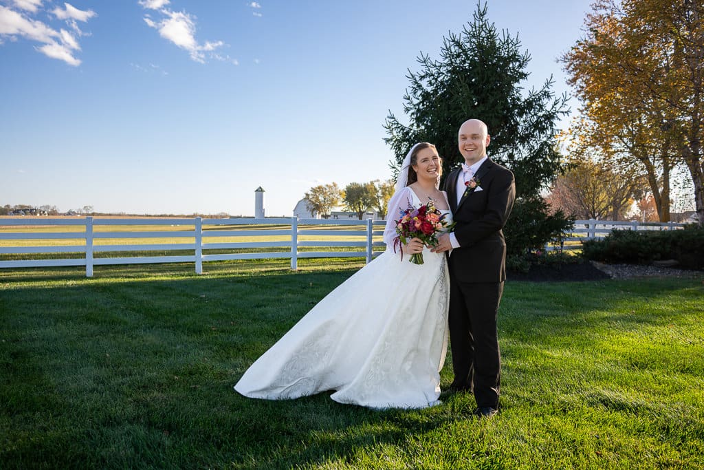 couple wedding portrait in front of Lone Summit Ranch
