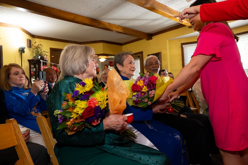 Vietnamese tea ceremony, flower gift to elders