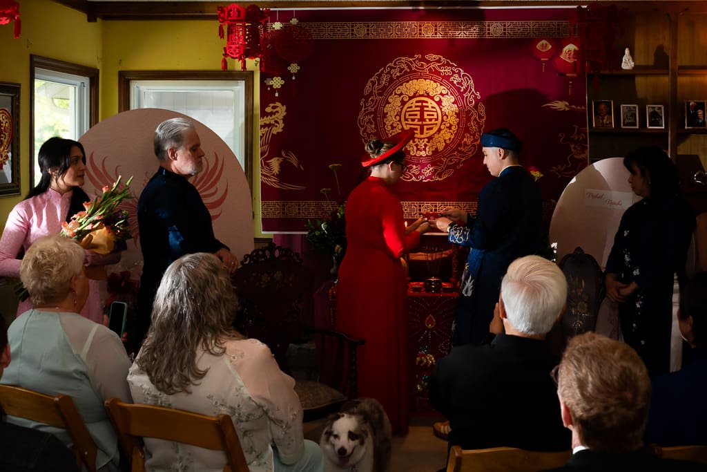 Couple getting tea during Vietnamese tea ceremony