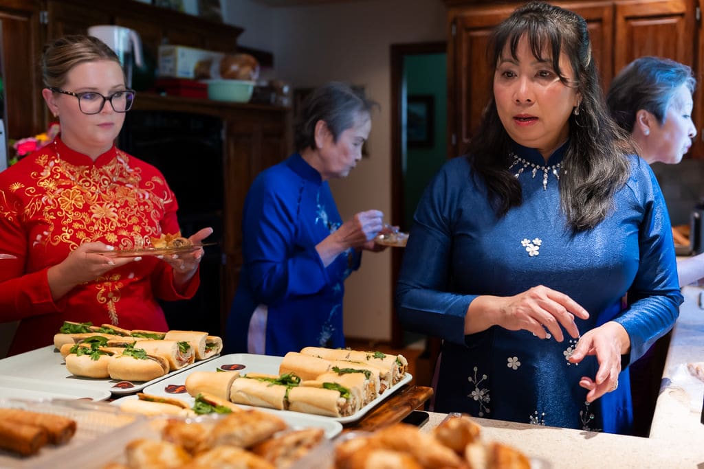 The meal buffet with the bride and mother of the groom