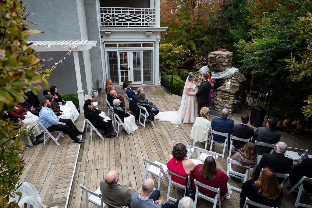 Fall wedding ceremony on the garden terrace at Southmoreland on the Plaza, an intimate wedding venue in Kansas City