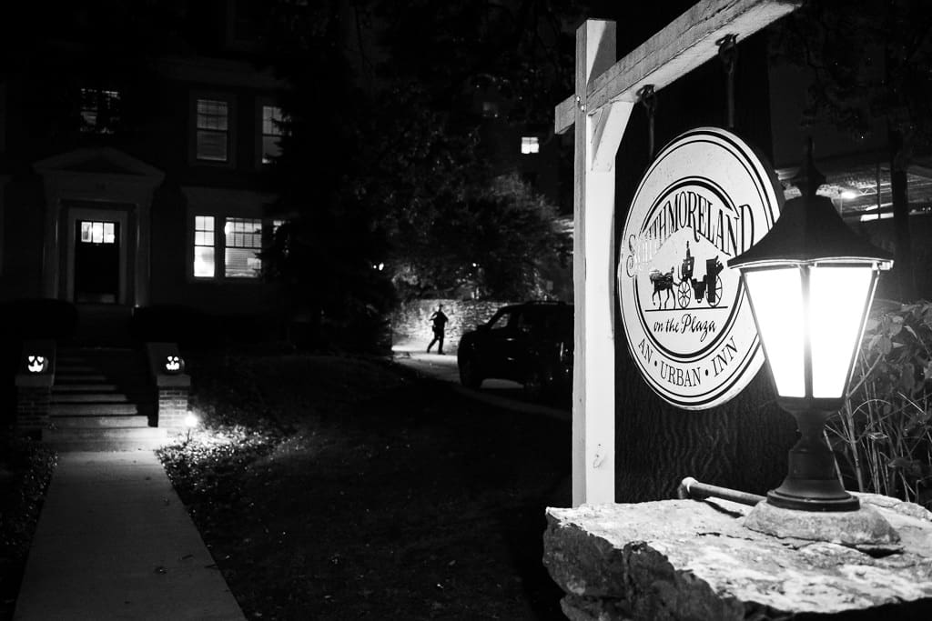 Black and white night view of the Southmoreland on the Plaza sign and lamp post, Kansas City bed and breakfast wedding venue